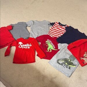 7 shorts sleeve shirts and 2 long sleeve shirts